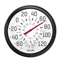 Close up of a 13.25 inch black and white thermometer and hygrometer with bold numerals and a red pointer.