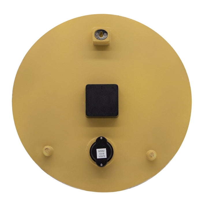 Back view of the terra cotta stone clock showing a yellow circular back, top mounting block and a black control knob with a label