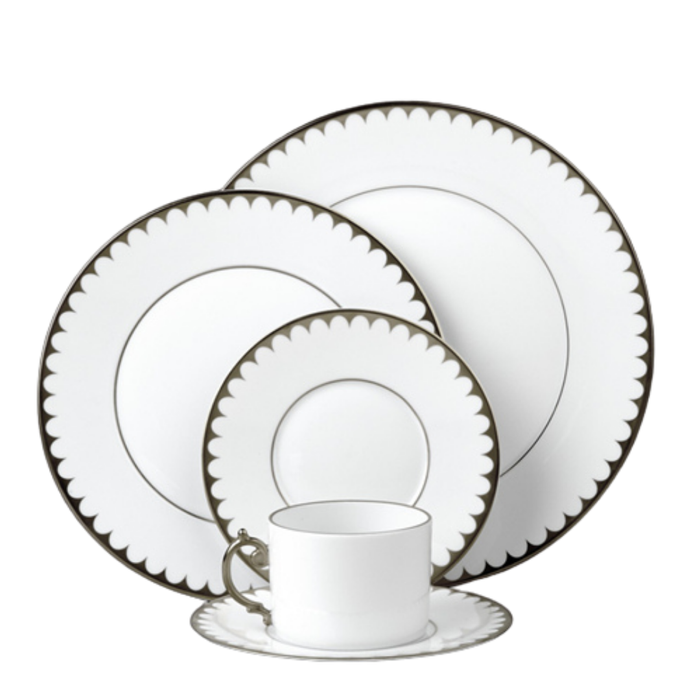 L'Objet's Aegean Filet Platinum Dinnerware set features white porcelain with scalloped dark borders and includes a dinner plate, salad plate, bread plate, teacup, and saucer—all in a matching, refined design.