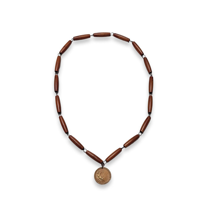 Bead rosary necklace with dark brown beads and small gold round medal pendant