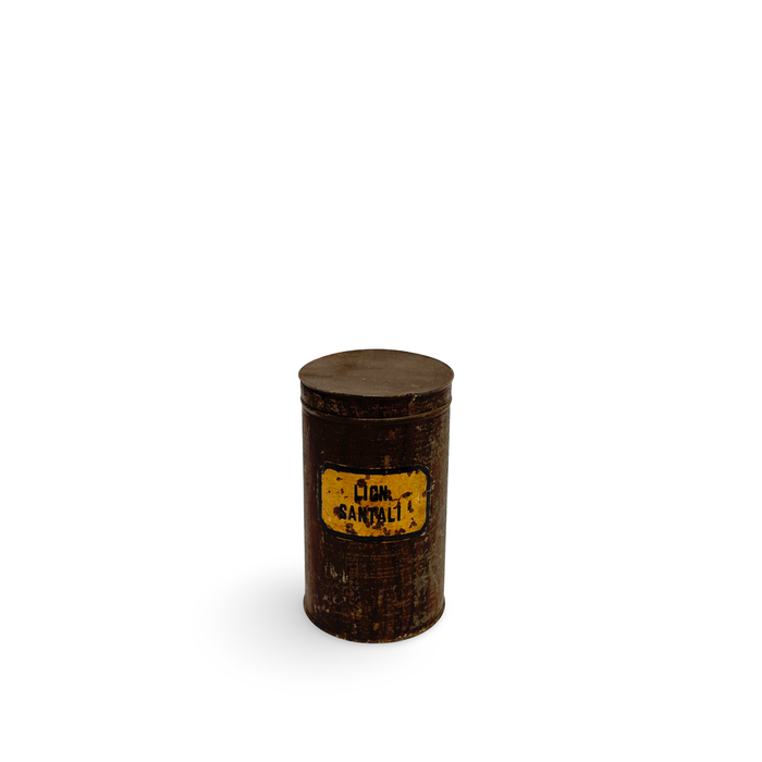 Dark brown antique pharmacy canister with round lid and yellow label reading SANTALITI