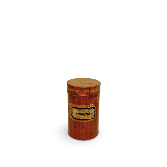 Amber antique pharmacy canister with round lid and vintage label