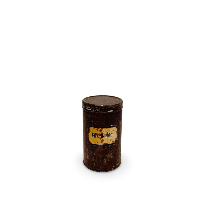 Dark brown antique pharmacy canister with round lid and vintage label