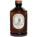 Bacanha salted caramel syrup bottle with front label on dark amber glass and wooden-style cap