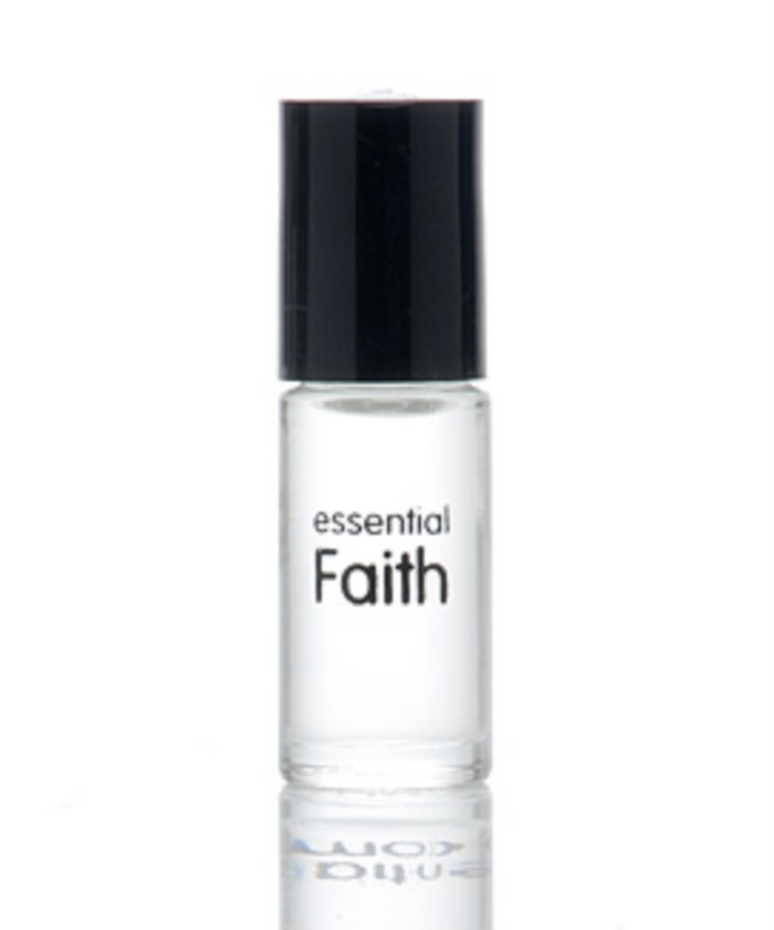 Fragrance bottle with black cap and clear body, 'essential Faith' label.