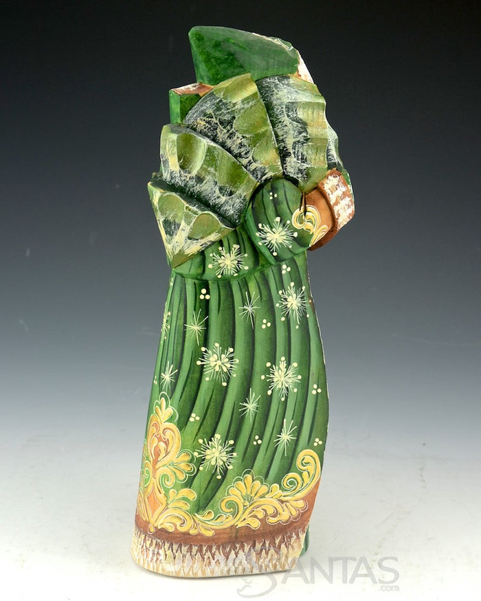 Green and Gold Carved Russian Santa With Tree over Shoulder