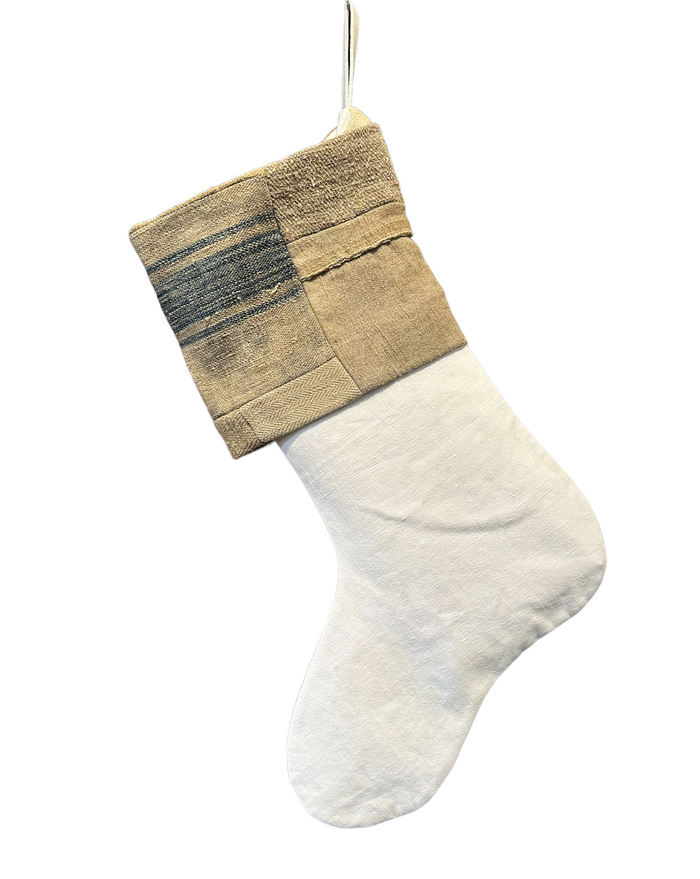 Handmade Christmas stocking with white fabric and multitone woven cuff panel, hanging loop
