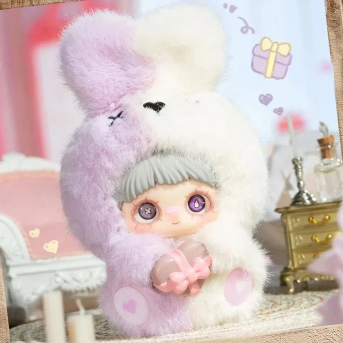 MayMei May I Love You Plush Keychain Blind Box featuring a doll in a fluffy bunny suit, holding a pastel gift in a kawaii diorama scene.