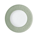 A Raynaud Mineral Irise Dinnerware - Celadon plate is shown from above, with a textured light green rim and smooth white center, set against a plain background.