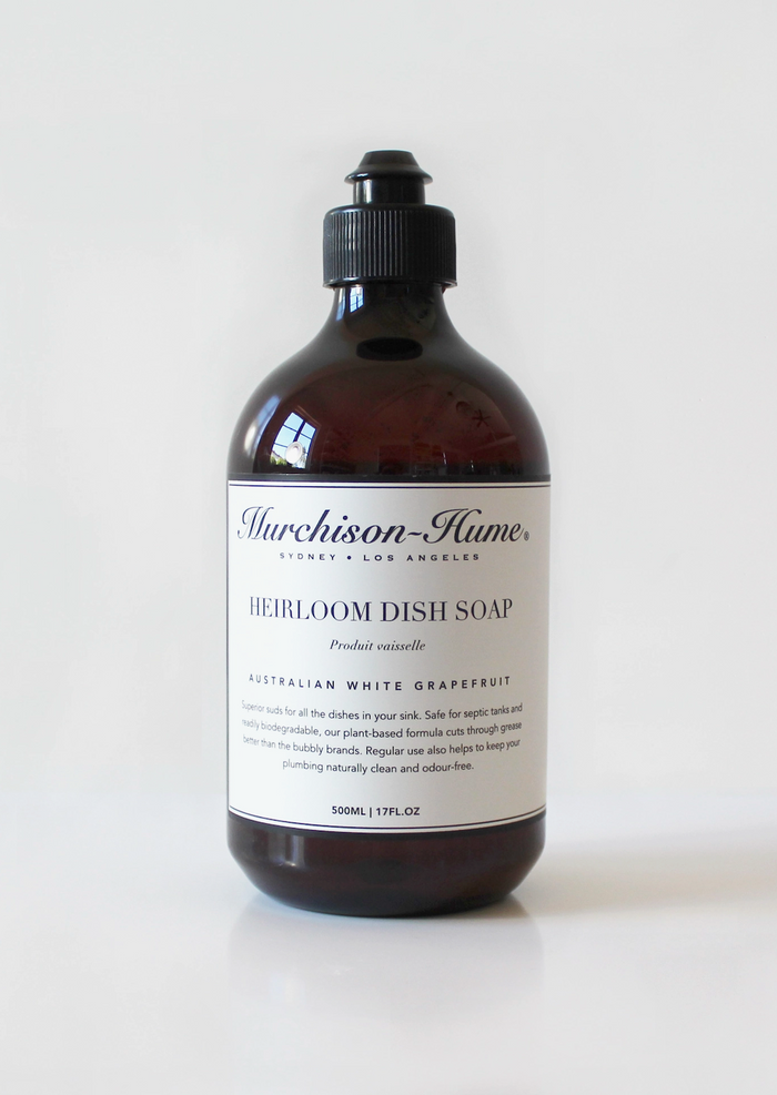 Heirloom dish soap bottle with black pump, amber liquid, White Grapefruit label