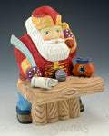 North Pole Logistics - Wooden Russian Santa at Desk