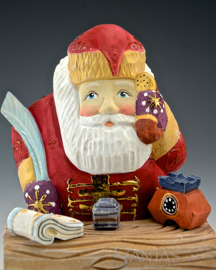 North Pole Logistics - Wooden Russian Santa at Desk