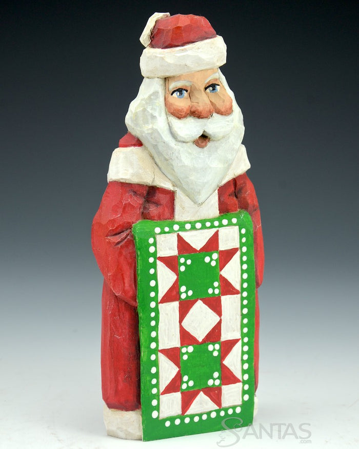 Russell Scott Flat Santa Holding Quilt