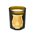 Scented candle in dark glass jar with gold crest label